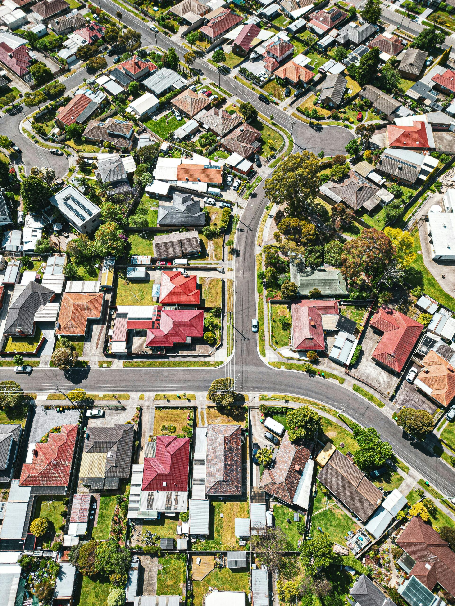 Aerial view of urban green spaces and residential streets